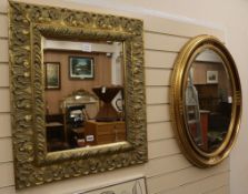 An oval gilt framed wall mirror and a rectangular gilt framed wall mirror (2) W.66cm