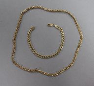 A 9ct gold necklace and a 9ct gold bracelet.