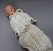 An Armand Marseille open mounted bisque headed doll