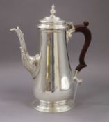 A 1960's silver coffee pot, C J Vander Ltd, gross 23.5 oz.