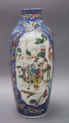 An 18th century Chinese export vase with panels of figures height 29cm