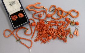 A mixed group of coral items including necklaces, brooch and earrings.