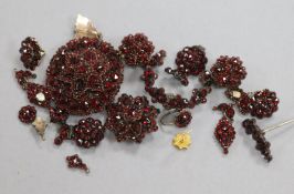 A group of assorted late Victorian garnet set jewellery including pendant's, studs, etc.