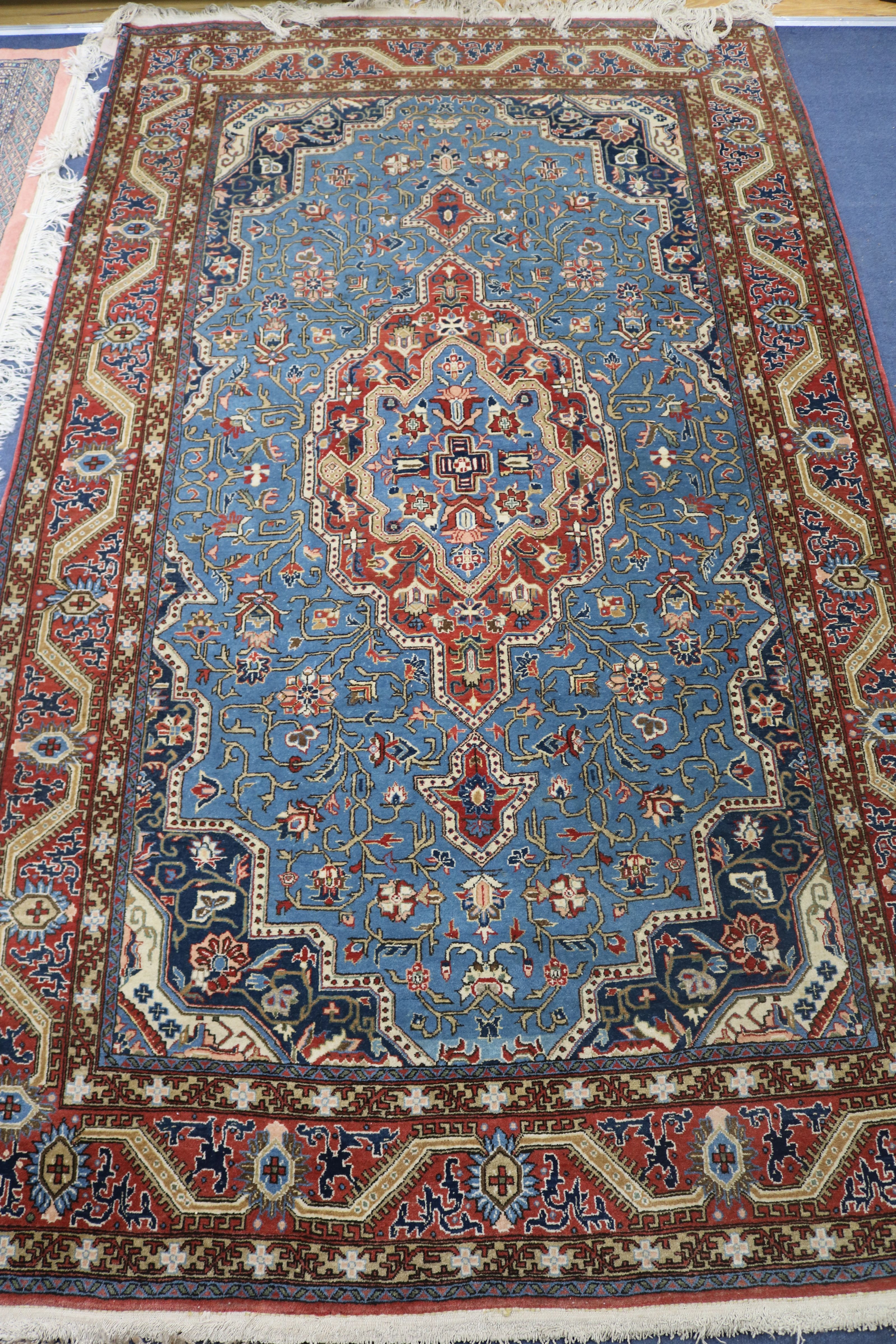 A caucasian rug 230 x 140cm