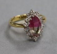 A modern 18ct gold marquise shaped watermelon tourmaline and diamond ring, size M.