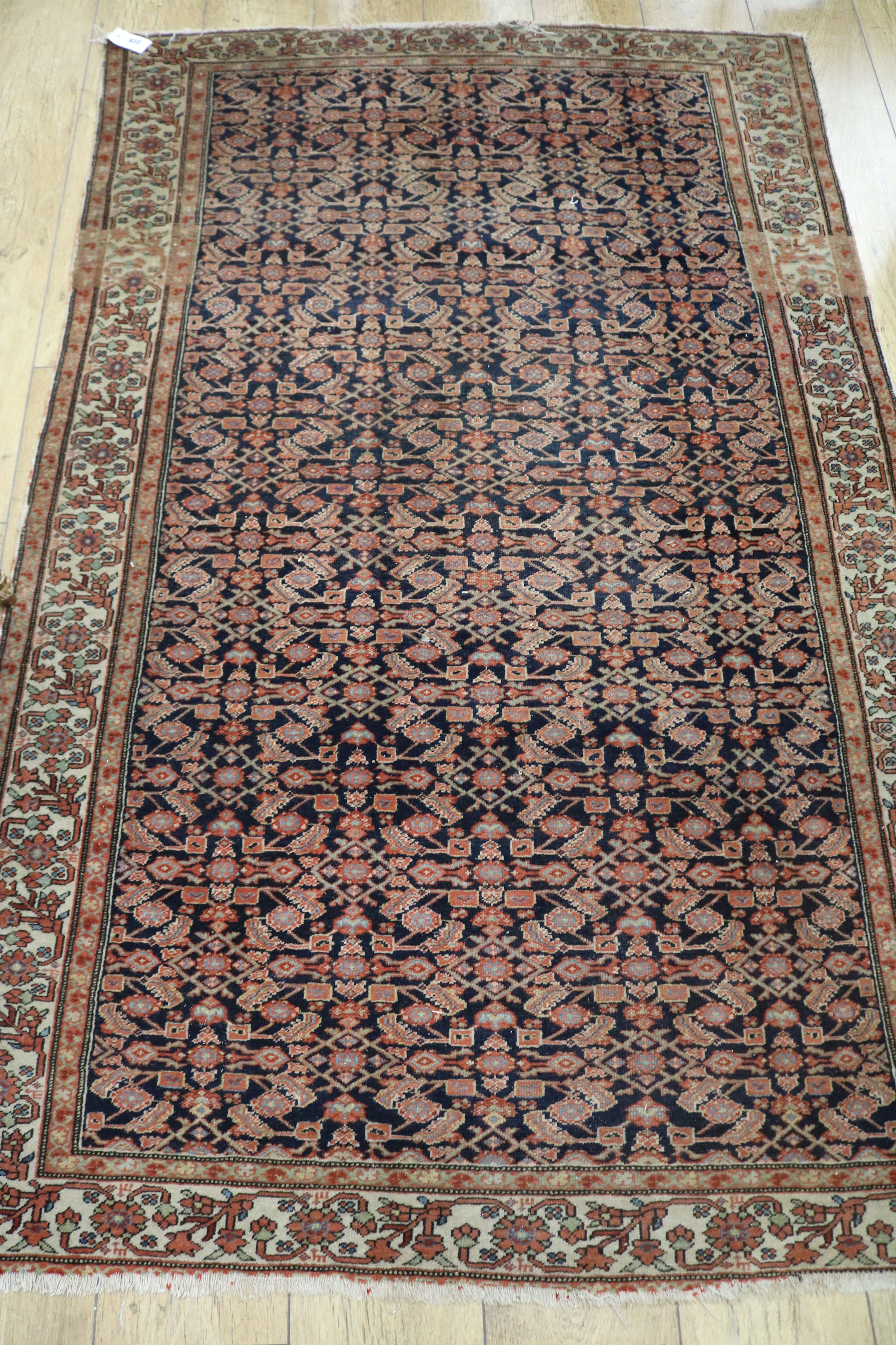 An Isphahan rust and blue rug 190 x 120cm