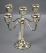 A modern silver four branch, five light candelabrum, Birmingham, 1978, 23cm.