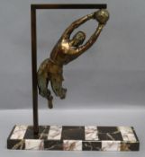 A French Art Deco model of a footballer on marble stand height 38cm