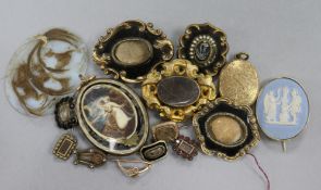 A small quantity of assorted mainly mourning jewellery including brooches, lockets etc.