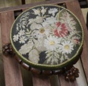 A Victorian mahogany tapestry topped footstool W.38cm