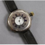 A gentleman's early 20th century silver half hunter wrist watch.