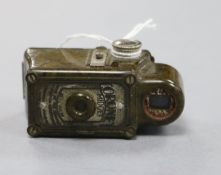 A Coronet Midget green miniature camera