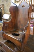 A child's rocking chair/commode W.42cm