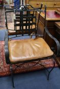 Six iron patio chairs with leather cushions