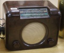 A 1930's Bush brown Bakelite radio in full working order length 29.5cm