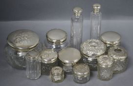 Thirteen assorted silver topped toilet jars, of varying shapes and sizes including Reynold's