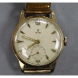 A gentleman's 1950's 9ct gold Tudor manual wind wrist watch, with engraved inscription.