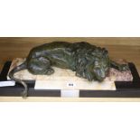 A bronzed spelter figure of a lion on marble base length 49cm