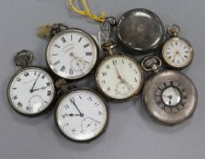 Six assorted silver pocket watches and a silver fob watch.