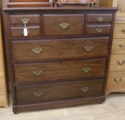 A late Victorian Scottish mahogany chest of drawers retailed by Shoolbred of London and a toilet