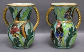 A pair of Vallauris two handled vases, decorated with fish height 21.5cm