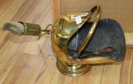 A brass coal scuttle and fire tools