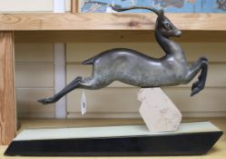 I. Rochard. An Art Deco bronze figure of an antelope, on marble base, signed length 56cm