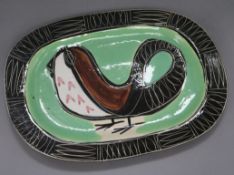 Jacques Pouchain. An oval studio pottery plate, signed length 31.5cm