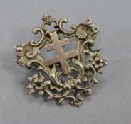 A late 19th century French? white and yellow metal brooch set with a cross of Lorraine, 36mm.