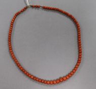 A single strand graduated coral bead necklace, gross 24.7 grams, 48cm.