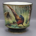 A jardiniere decorated with a pheasant height 19.5cm
