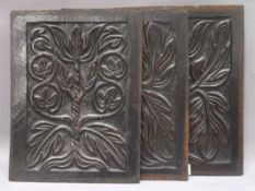 Three carved oak panels 38 x 29cm