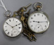 Two silver pocket watches and ten assorted watch keys.