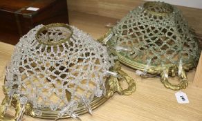 A pair of ormolu and glass ceiling lights length 47cm