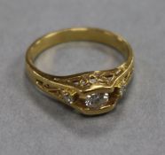 A small 18ct gold and three stone diamond ring, size I.