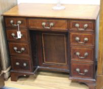 An Edwardian inlaid walnut kneehole desk W.95cm