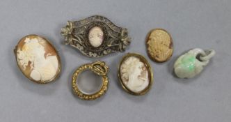 A small group of assorted jewellery including a jade pendant, three cameos, a brooch and a locket.