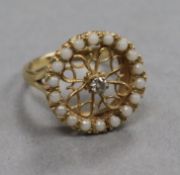 A 14ct gold, diamond and cabochon chalcedony? set openwork ring, size P/Q.