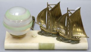 An Art Deco nautical themed lamp, on onyx base