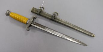 An Army Officers dagger with yellow grip, maker WKC