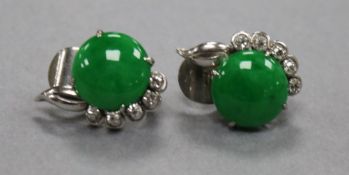 A pair of 14ct white gold, jadeite and diamond ear clips, 18mm.