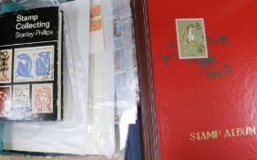 Thirteen albums of stockbooks of stamps including Isle of Man and Channel Islands