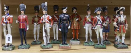 A group of twelve Sitzendorf and Dresden porcelain figure of soldiers and guards, 20th century,