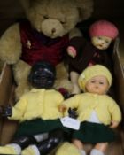 Three dolls and a teddy