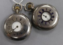 Two silver half hunter pocket watches.