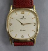 A gentleman's gold plated and steel Omega de Ville wrist watch, no winding crown.