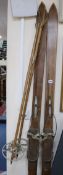 A pair of wooden skies and wooden poles length 189cm