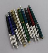 Assortment of Parker pens and Parker fountain pen and another fountain pen