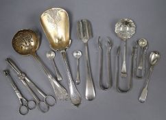 A small group of mixed silver and plated cutlery.