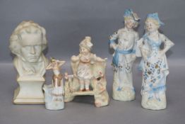 A collection of Bisque figures tallest 23cm